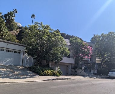 Beautiful Laurelwood home with lush landscaping and a well-maintained exterior
